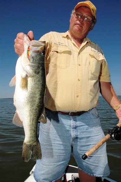 Capt. Steve Niemoeller of Central Florida Guide Service shows off a bass he caught on a SteelShad blade bait while fishing on the Harris Chain of lakes near Mount Dora, Fla.  (Photo by John N. Felsher)