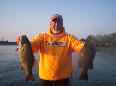 captain tim with a couple of mid 5lb smallies