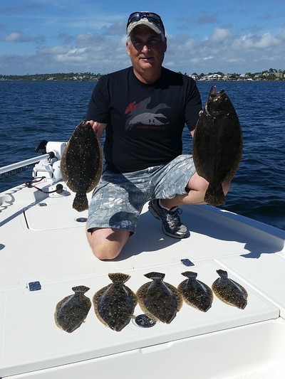 Steve with a nice mess of flounder