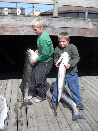 kids with striped bass