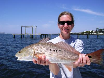 Danielle with her first ever Red Fish!
