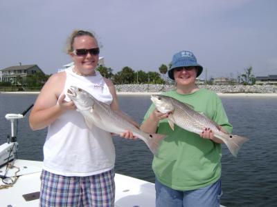 Courtney & Kim Catching Red Fish