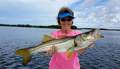 Sue with a nice 28 inch snook.