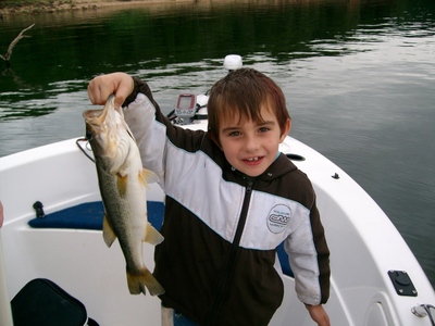 Little Boy catching Bass