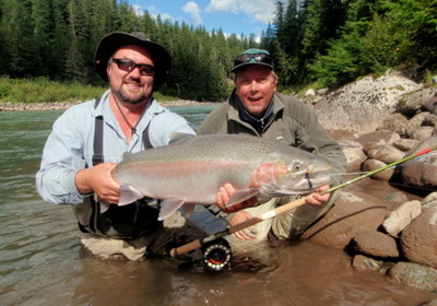 Photo of the Week: SEASON REVIEW: Dustin Kovacvich holds his clients Steelhead