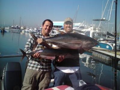 Happy guys with their Yellowfin Tuna catch
