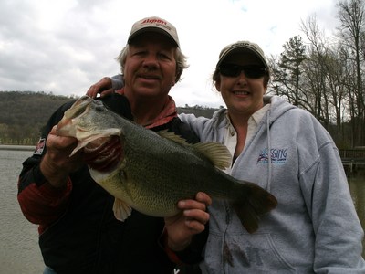 A happy lady with an 11 pound bass!