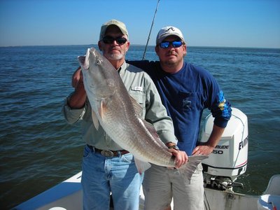 Captain Eric Moody (R) his Dad and a Bull Red.