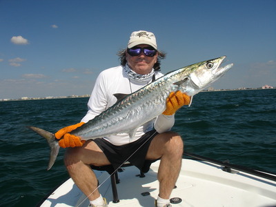 Joe Conover largest Kingfish on light tackle. Quickly posed with Captain Russ for a quick release.