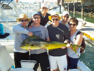 Tyler Mincemoyer and friends from State College, PA with a 30 lbs dorado aboard