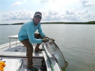 Scott with a tarpon. 14 minutes to the boat!
