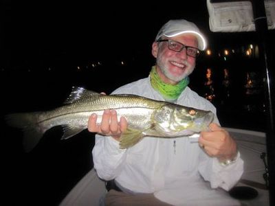 Dan Stults, from Highland Park, IL, with a snook caught and released on a Sarasota Bay lighted dock on a CAL jig with a shad tail while fishing with Capt. Rick Grassett.