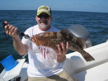 24-inch red grouper, on squid, 24 miles west of New Pass