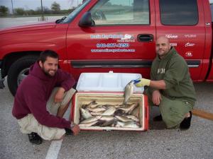 Eddie and Francisco with limits of white bass
