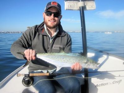 Emerick Corsi, from Chicago, IL, with a nice Sarasota Bay Spanish mackerel caught on an Ultra Hair Clouser fly while fishing with Capt. Rick Grassett.
