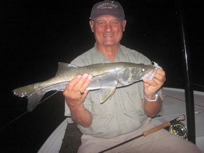 Frank Zaffino, from Rochester, NY, with a snook caught and released on a Grassett Snook Minnow fly while fishing the ICW near Venice at night with Capt. Rick Grassett.