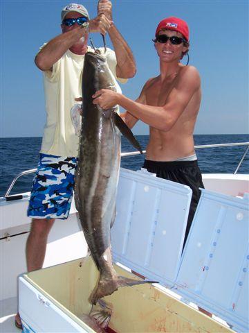 Capt. Stephen and Dustin Reed with 62 pound cobia