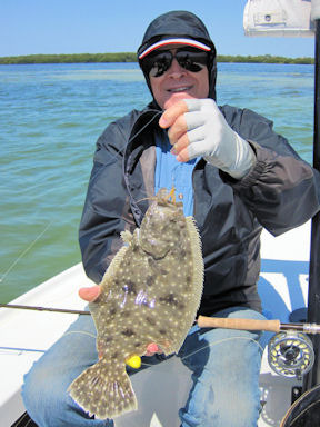 Gary Marple Sarasota Bay fly flounder caught and released with Capt. Rick Grassett.