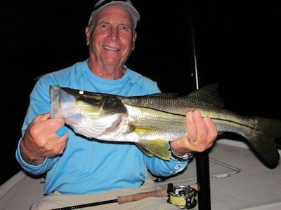 Gary Mintz, from CO, caught and released this snook on a Grassett Snook Minnow fly while fishing Sarasota Bay lighted docks with Capt. Rick Grassett.