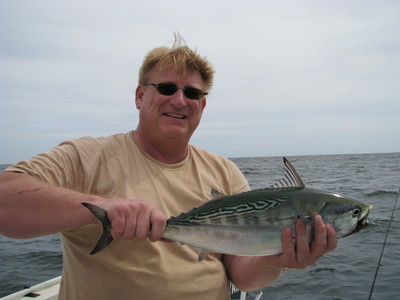 Capt. Paul Eidman with a 6lb Albie that fell for a epoxy minnow