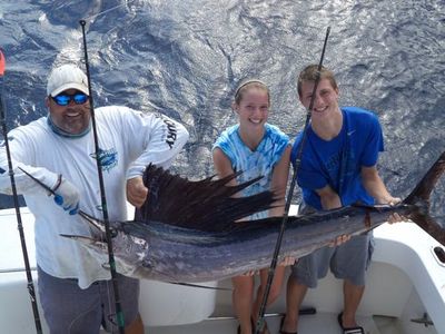 Sara was fighting a big Sailfish and I do mean a big one because after a good 20 min fight she had her 89-inch sailfish to the boat!