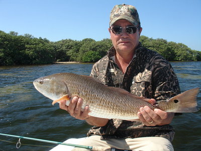 Joe Conover's first redfish. Photo by Captain Russ Shirley.