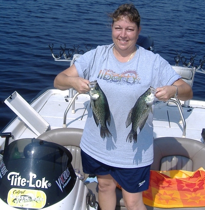 Kim Newton shows some of Lake Lochloosa fish