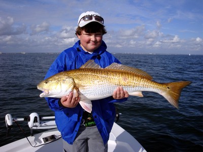 Logan with his biggest Red Fish