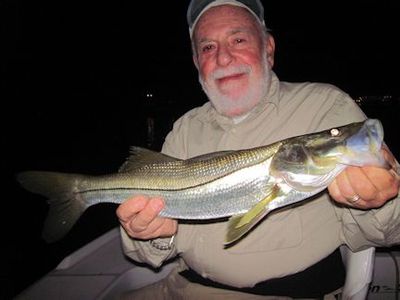 Martin Marlowe, from NY, with a snook caught and released on a Grassett Snook Minnow fly while fishing the ICW near Venice at night with Capt. Rick Grassett.