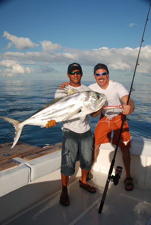 MIKE DANNON WITH ROOSTER FISH