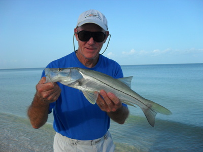 John Goodheart with his first sightfished beach Snook ever