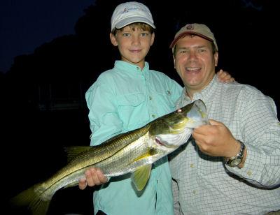 Scott and Seth Swango, from Springfield, MO, with a nice Siesta Key snook caught and released while fishing with Capt. Rick Grassett.