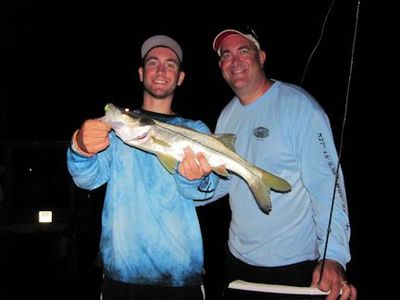 Scottie and Scott Heidler with a Sarasota Bay snook caught and released on a CAL jig with a shad tail while fishing with Capt. Rick Grassett.