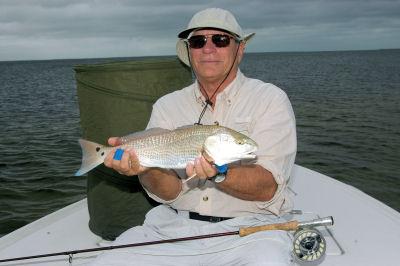 Tony Soltys, from CT and AK, caught this red on a black Grassett's Flats Minnow fly while fishing Charlotte Harbor with Capt. Rick Grassett.