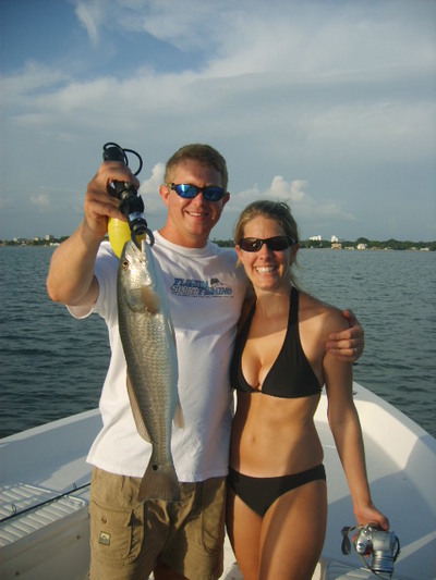 Russ & Susie with redfish caught using a pin fish