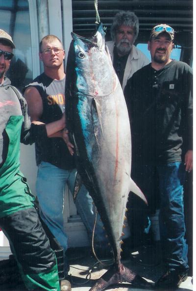 Russ Hedland party with 210 lb. tuna