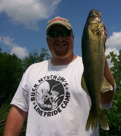 Guide Joel DeBoer displays a nice Wisconsin River walleye
