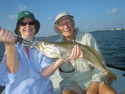 Linda and Charlie Alexander, from Osprey, FL, with a 4 1/2-pound trout caught and released on a DOADeadly combo while fishing Sarasota Bay with Capt. Rick Grassett.