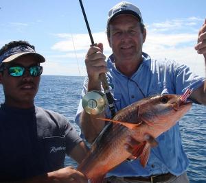 Joe with a mullet snapper on fly