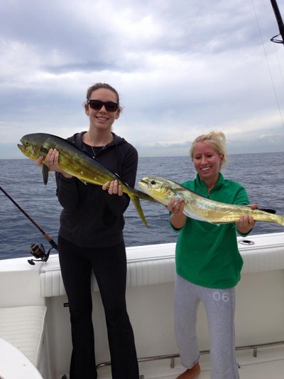 Lady anglers on a good dolphin bite. Gettin Lucky Sportfishing
