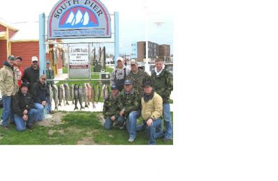A Nice Variety Of Trout & Salmon For These Happy Anglers During An Early May Outing Aboard The Dumper Dan Boats Of Sheboygan!