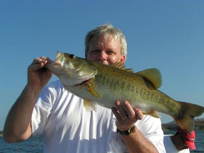Dan Owen shows off a bass he caught while fishing with Anglers Inn at Lake El Salto, Mexico.