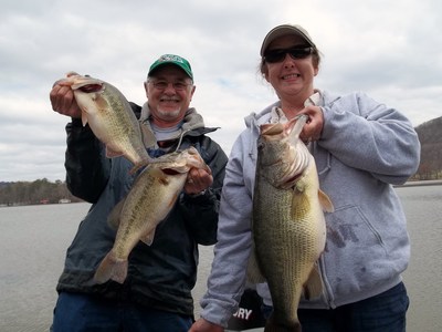 A pair of happy anglers, two five pounders and an 11 pound bass!
