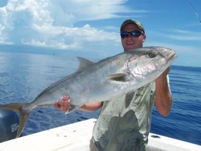 Ryan Simmons of Pure Fishing in Tampa FL with a 40lb amberjack caught with SeaSquared Charters