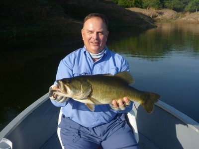 Carl J. Hochrein shows off the 10-pound bass he caught with Anglers Inn at Lake El Salto.