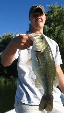 Joe Szarkowitz shows off a chunky largemouth caught from the thick stuff