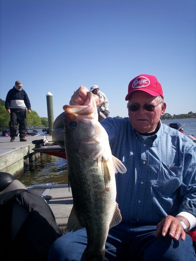 A big, Guntersville Lake bass weighing 8 pounds, caught at midday on a Scum Frog topwater lure