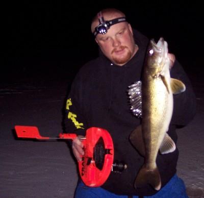Guide Joel DeBoer displays one of several nice walleyes caught in an evening of fishing.