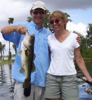 Matt and Mary with the bass they both hooked