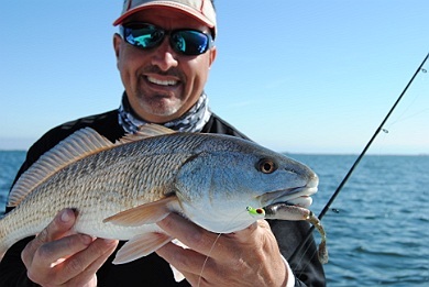 Capt. John with a nice slot redfish
